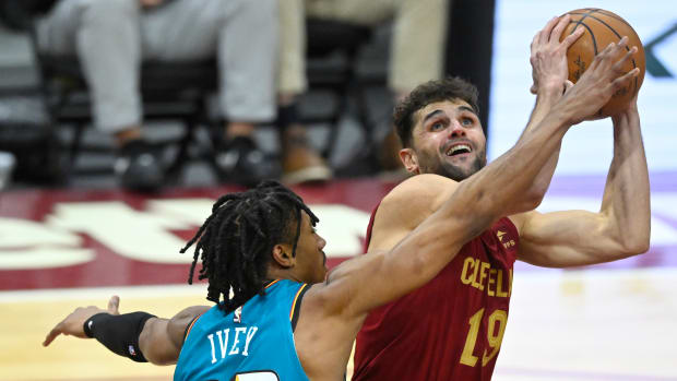Detroit Pistons guard Jaden Ivey (23) defends Cleveland Cavaliers guard Raul Neto (19) in the fourth quarter at Rocket Mortgage FieldHouse.